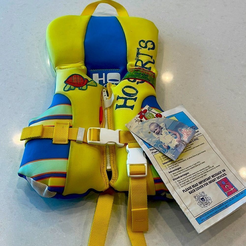 HO sports life jacket, new with tags. Up to 30 lbs. great colors for boy or girl